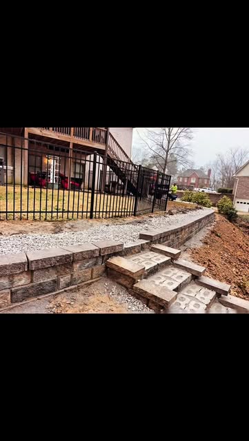Stone retaining wall and steps